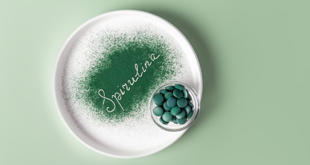 White plate with text and pills.