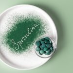 White plate with text and pills.