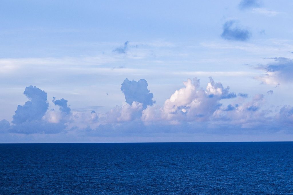 ocean and sky with clouds
