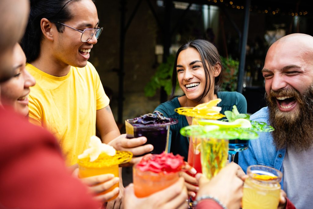happy multiethnic group of friends drinking trendy 2026 01 08 22 54 38 utc 1
