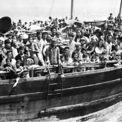 boat overflowing with Vietnam War refugees