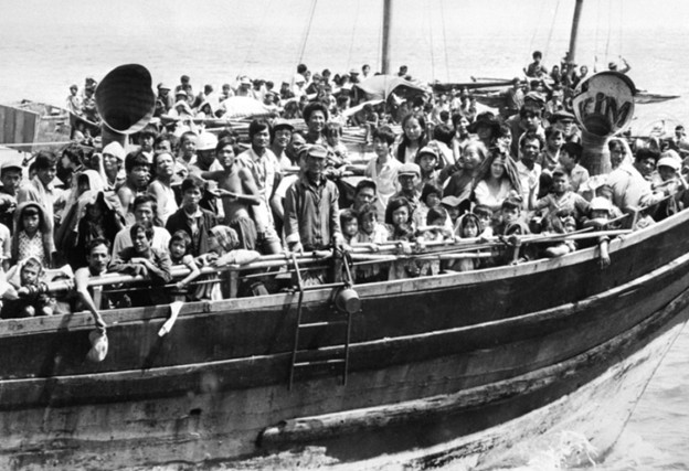 boat overflowing with Vietnam War refugees